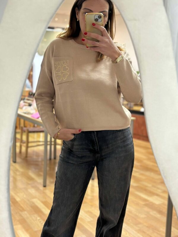 Le pull Love